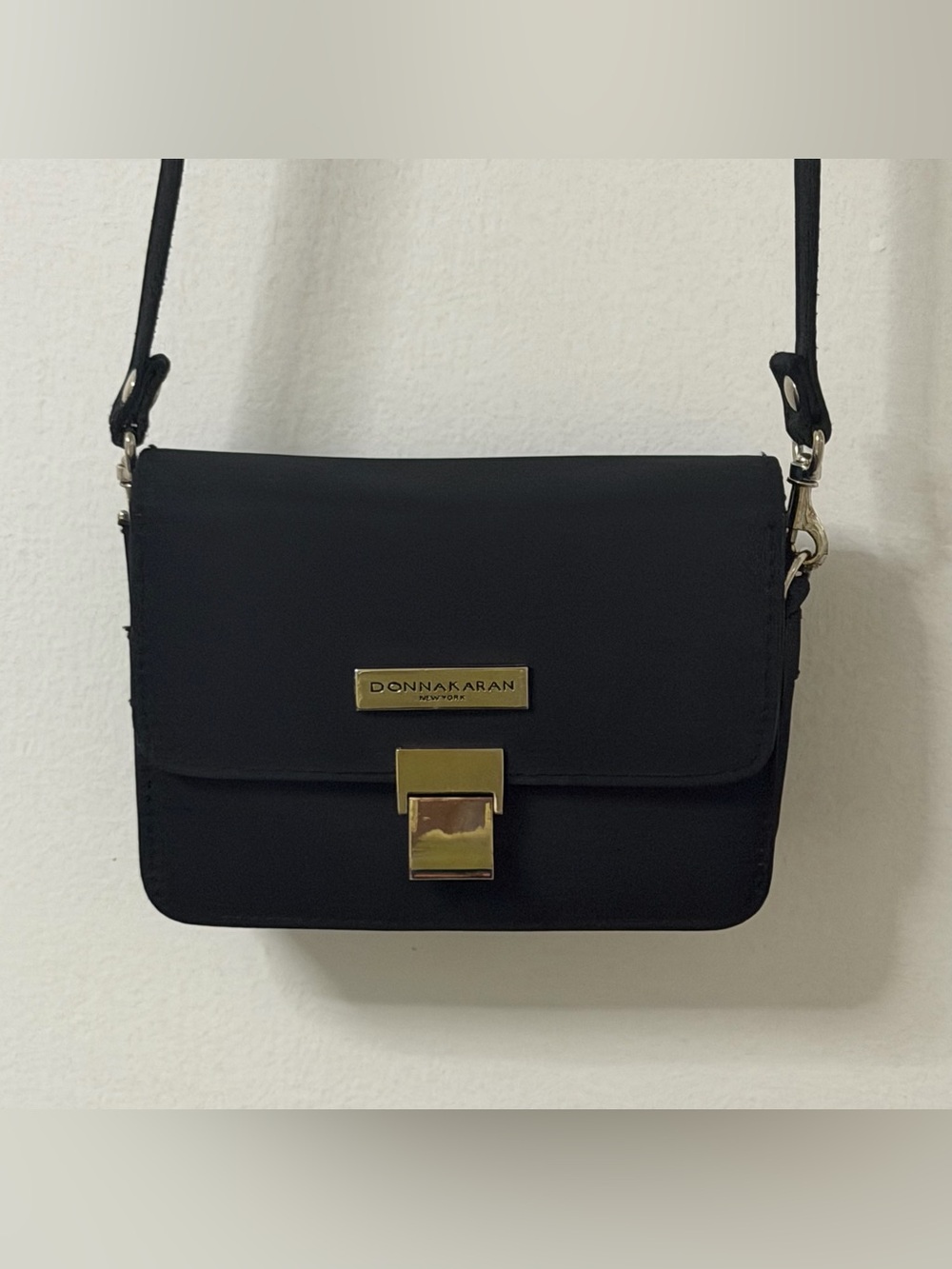 Donna Karan Black Crossbody with silver Tone Plaque